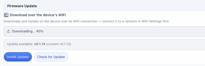 The Firmware Update panel showing a download in progress at 40 percent